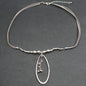 Silver beaded pendant necklace with suede strap and oval silver plate, stylish jewelry by Suzie Blue Canada