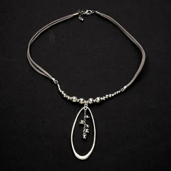 Silver beaded pendant necklace with oval silver plate on a suede strap, by Suzie Blue Canada.