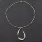 Silver plate twisted oval necklace by Suzie Blue Canada featuring a sleek, elegant design with a polished finish.