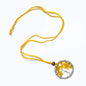 Suzie Blue Canada Tree of Life necklace featuring a natural stone pendant on a delicate chain.