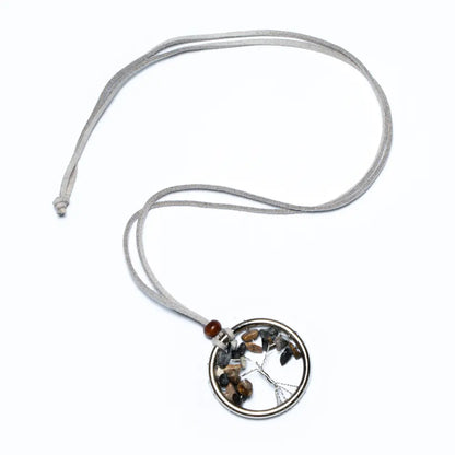 Suzi Blue Canada Tree of Life necklace featuring a natural stone pendant on a silver chain.