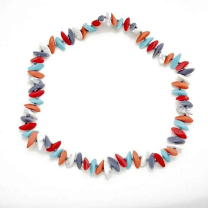 Resin Slice Necklace by Suzie Blue Canada featuring beaded jewelry with colorful resin slices and intricate beadwork.