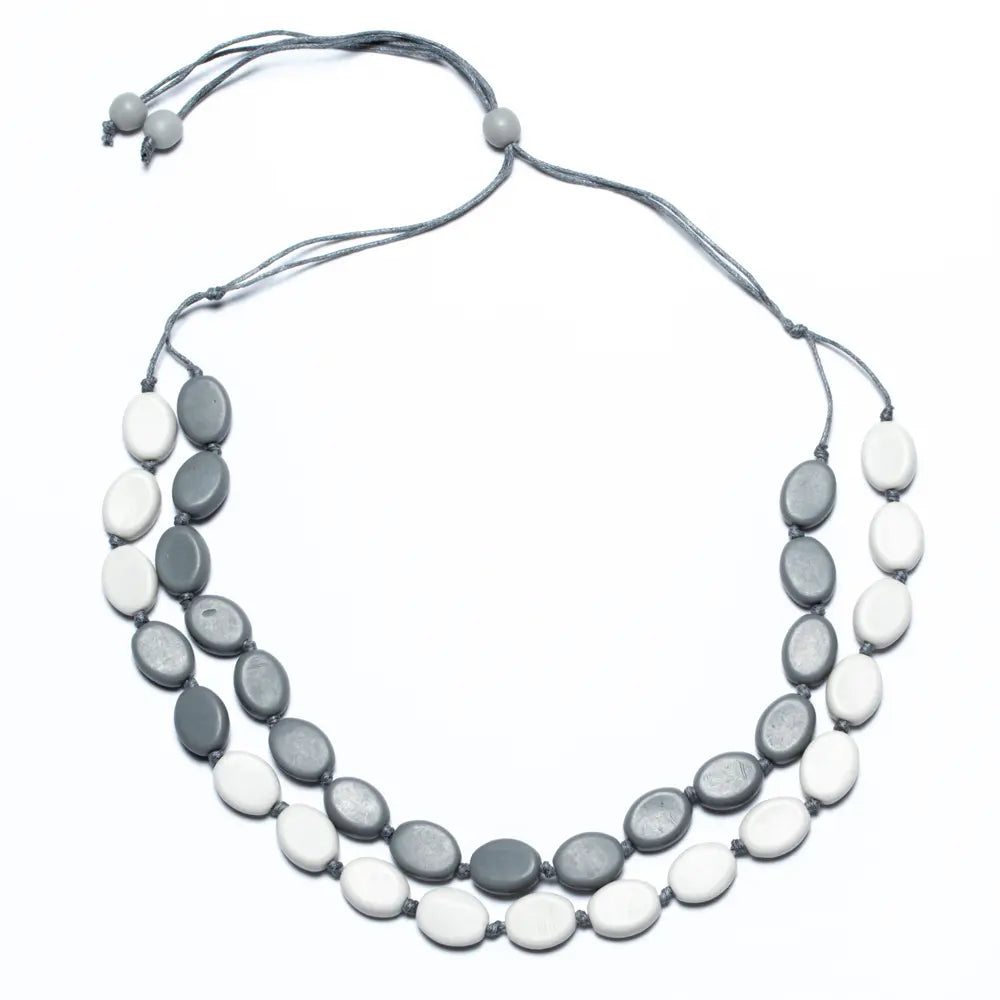 Resin two-tone double strand necklace by Suzie Blue Canada with elegant layered design and mixed neutral colors.