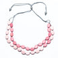 Silver and pink resin double strand necklace by Suzie Blue Canada featuring a two-tone, elegant design suitable for stylish wear.