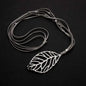Silver-plated suede necklace featuring a leaf pendant, stylish jewelry piece by Suzie Blue Canada.
