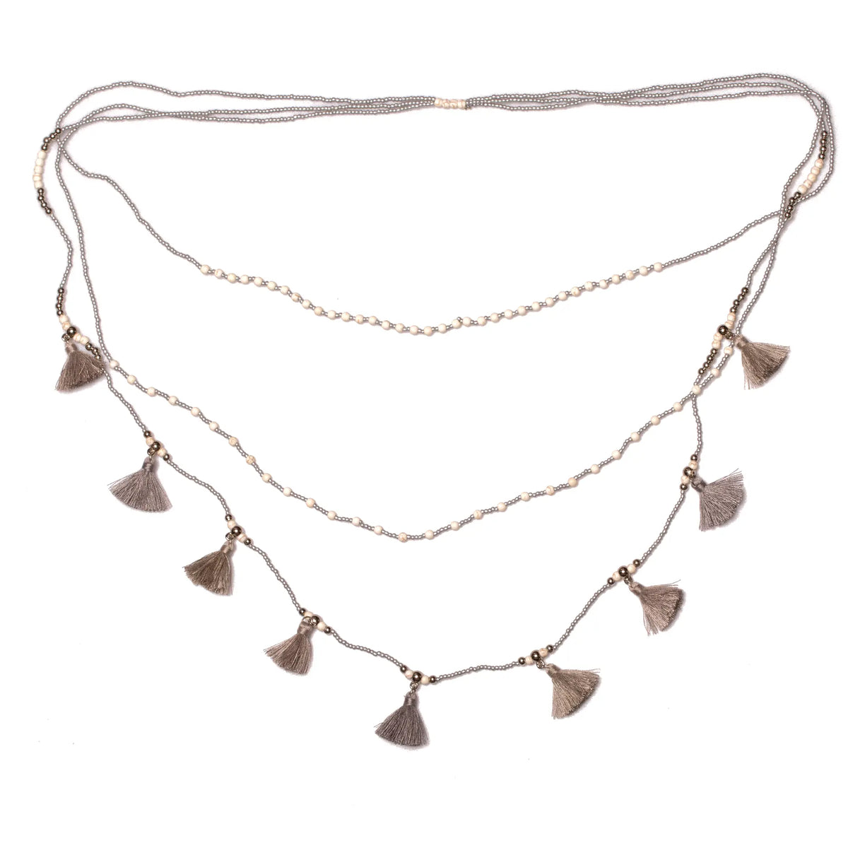 Triple strand tassel necklace by Suzie Blue Canada featuring layered chains and elegant tassels for chic style.