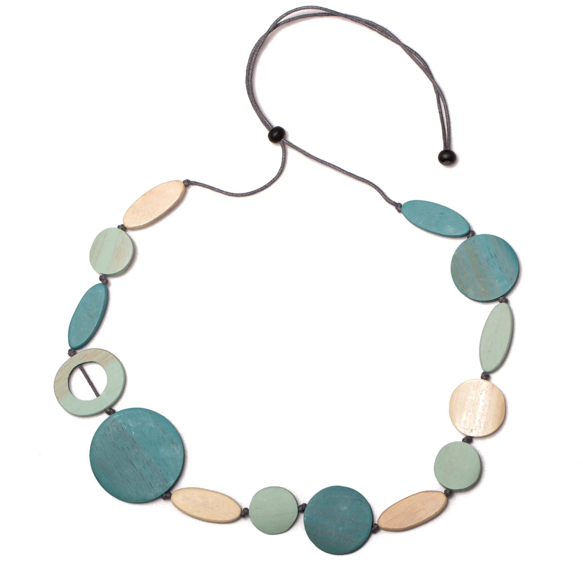 Long wooden necklace by Suzie Blue Canada featuring mixed shapes in a unique, artistic design.