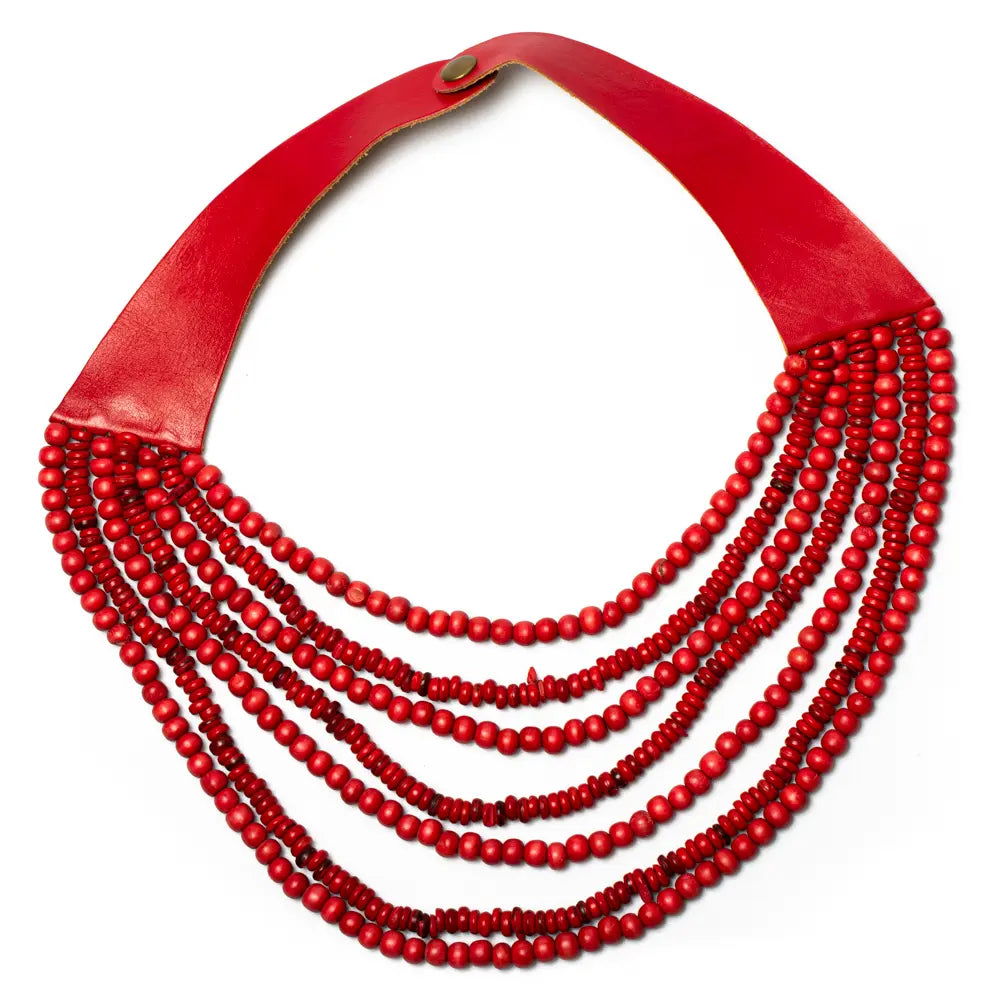 Multi-strand wooden bead necklace by Suzie Blue Canada featuring natural wooden beads and layered design.