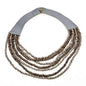 Multi-strand wooden bead necklace by Suzie Blue Canada featuring natural wooden beads and layered design.
