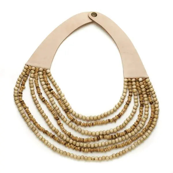 Multi-strand wooden bead necklace by Suzie Blue Canada featuring natural wooden beads and layered design.