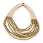 Multi-strand wooden bead necklace by Suzie Blue Canada featuring natural wooden beads and layered design.