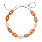 Wooden oval necklace by Suzie Blue Canada featuring a smooth, natural wood finish with a sleek, elegant design.
