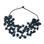 Long leather cup necklace with multiple strands, stylish design by Suzie Blue Canada, perfect for layered, trendy jewelry looks.