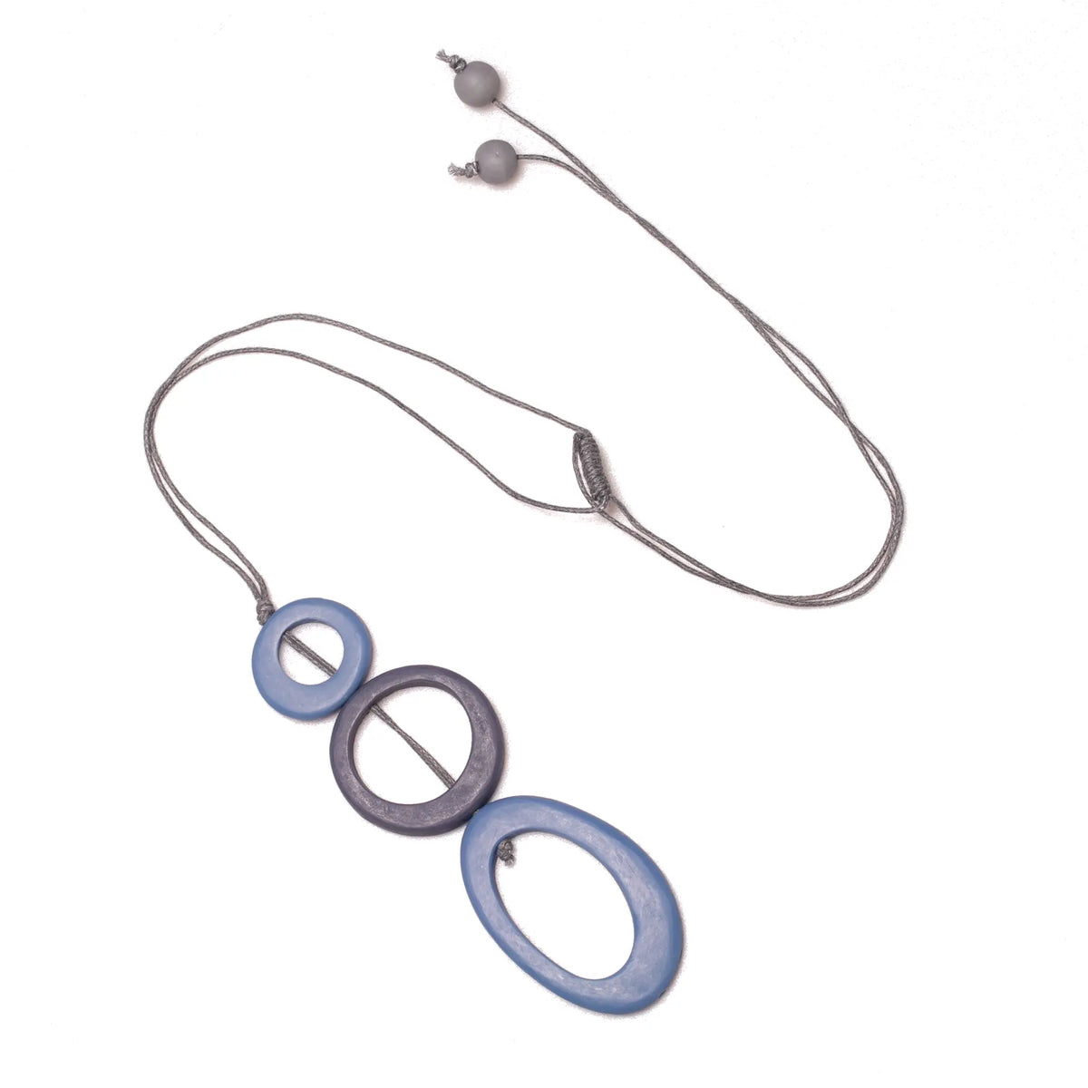 Suzie Blue Canada tonal resin hoop pendant necklace featuring an elegant triple resin design on a delicate chain.
