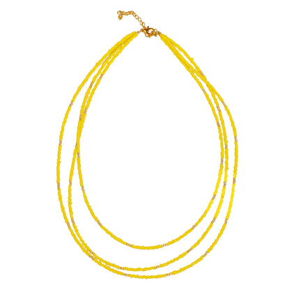 Triple strand seed bead necklace with gold accents by Suzie Blue Canada, featuring colorful beads and elegant design.