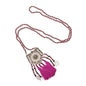 Long crystal necklace with a patterned metal pendant from Suzie Blue Canada, featuring sparkling crystals and intricate metalwork.