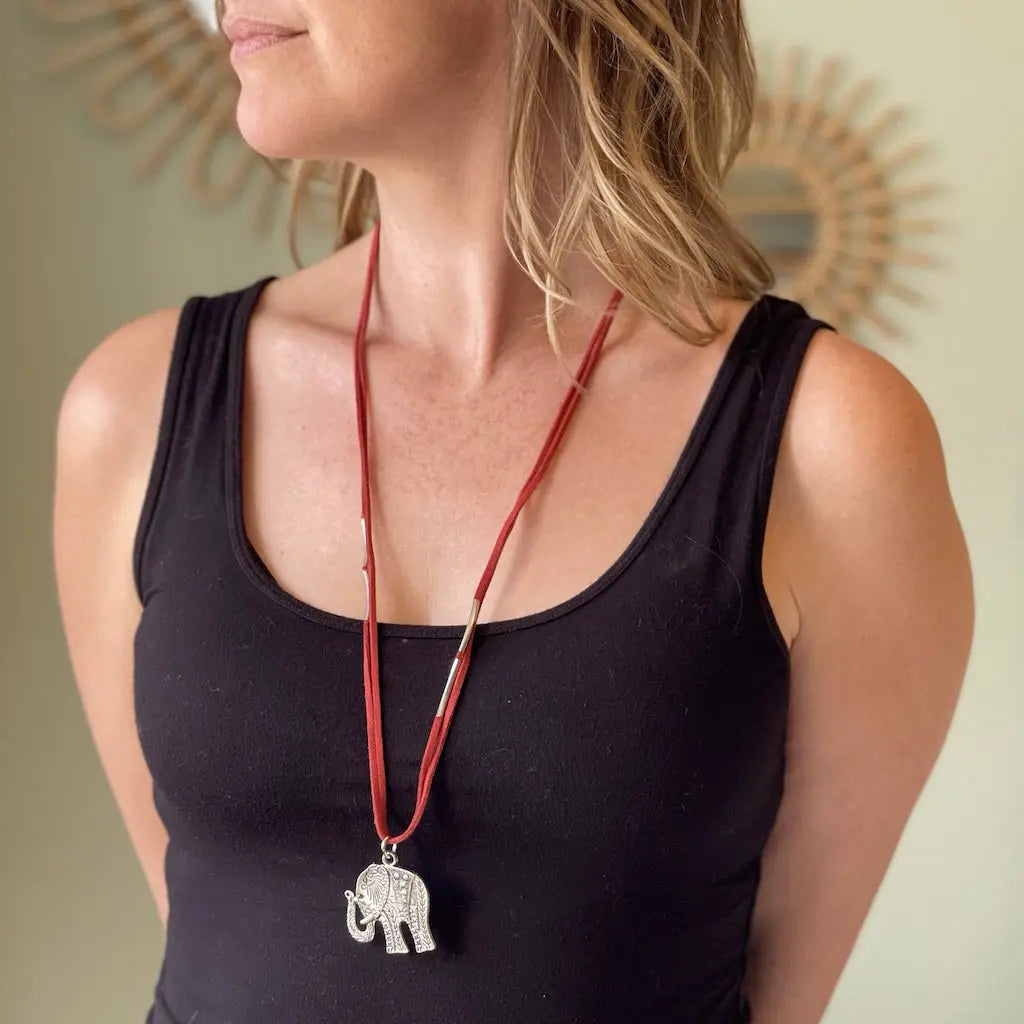 Elephant suede pendant necklace by Suzie Blue Canada featuring a stylish, handcrafted elephant charm on a suede cord.