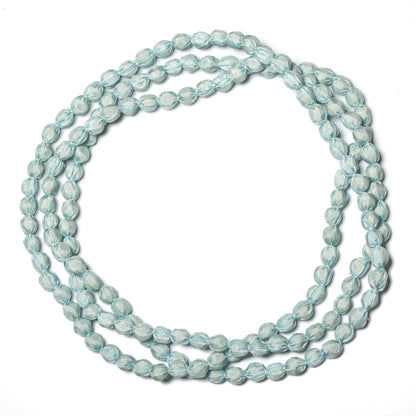 Extra long fabric ball necklace by Suzie Blue Canada featuring colorful fabric-covered beads and a stylish, elongated design.