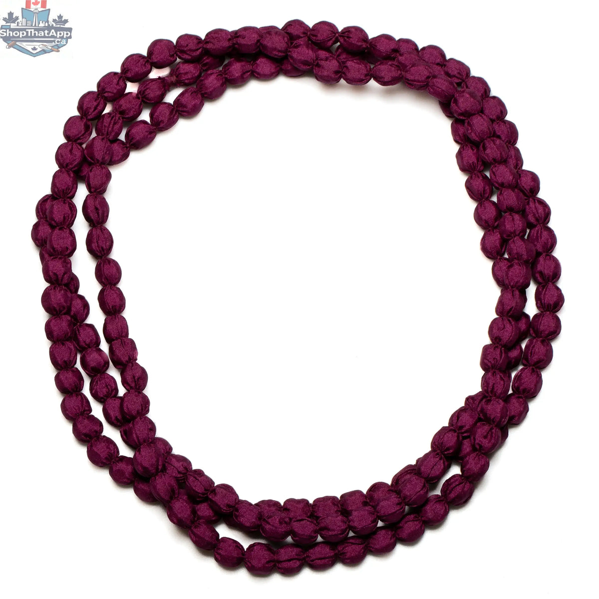 Suzie Blue Canada extra long fabric ball necklace with large colorful fabric-covered beads on a long chain.