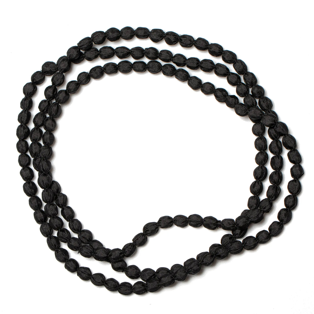 Suzie Blue Canada extra long fabric ball necklace featuring colorful fabric-covered beads on a long cord.