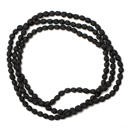 Suzie Blue Canada extra long fabric ball necklace featuring colorful fabric-covered beads on a long cord.