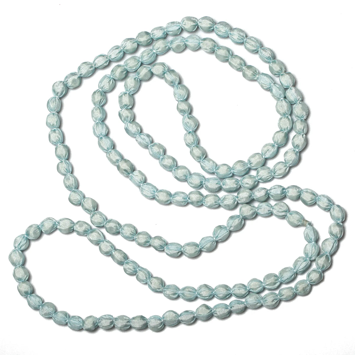 Suzie Blue Canada extra long fabric ball necklace with colorful fabric-covered beads on a silver chain.