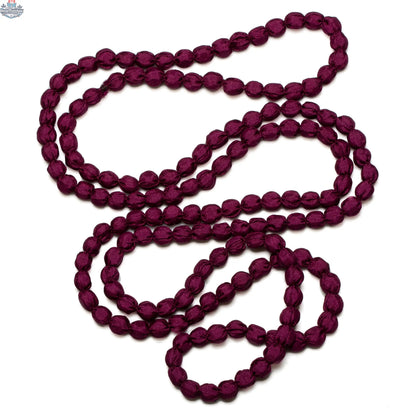 Suzie Blue Canada extra long fabric ball necklace with colorful fabric balls on a chain, stylish jewelry accessory.
