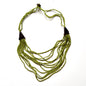 Multi-strand wood necklace with unique detailing from Suzie Blue Canada, featuring natural wooden beads and intricate design.