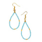 Tear drop seed bead earrings with gold accents by Suzie Blue Canada, featuring elegant seed bead design and gold details.