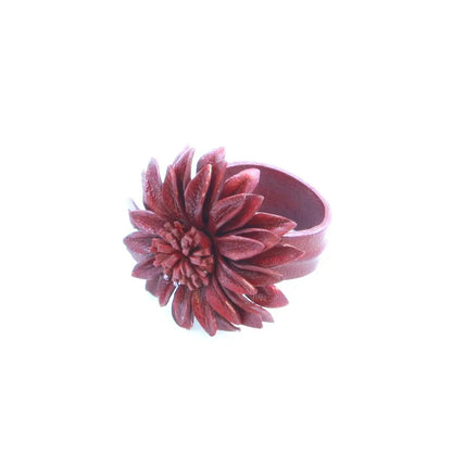 Leather flower ring by Suzie Blue Canada featuring a detailed floral design on a stylish leather band.