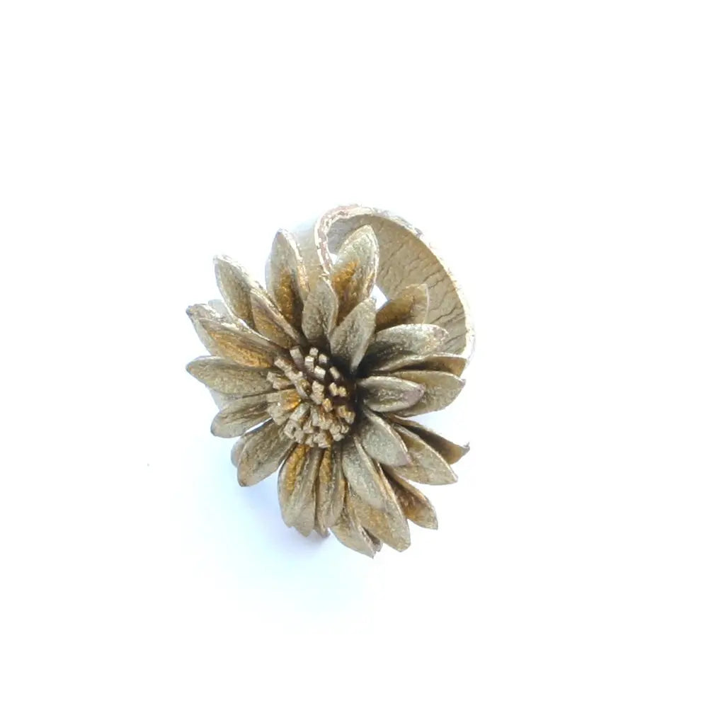 Leather flower ring by Suzie Blue Canada featuring a detailed leather flower design on a silver band.