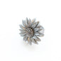 Leather flower ring by Suzie Blue Canada featuring a detailed floral design on a sleek ring band.