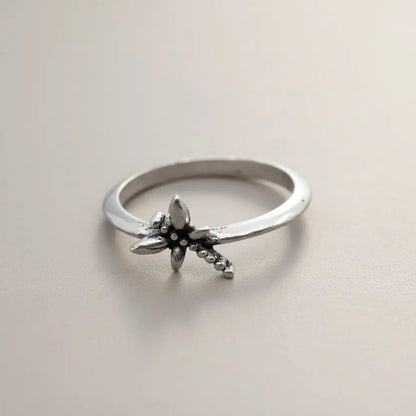 Silver dragonfly ring by Suzie Blue Canada featuring an elegant, unique design in a polished silver finish.
