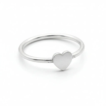 Silver plated heart ring from Suzie Blue Canada featuring a delicate heart design, perfect for daily wear or special occasions.