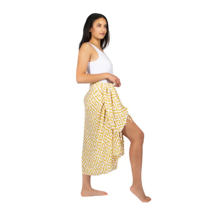Yellow sarong with geometric print by Suzie Blue Canada, featuring a stylish design perfect for trendy summer outfits.