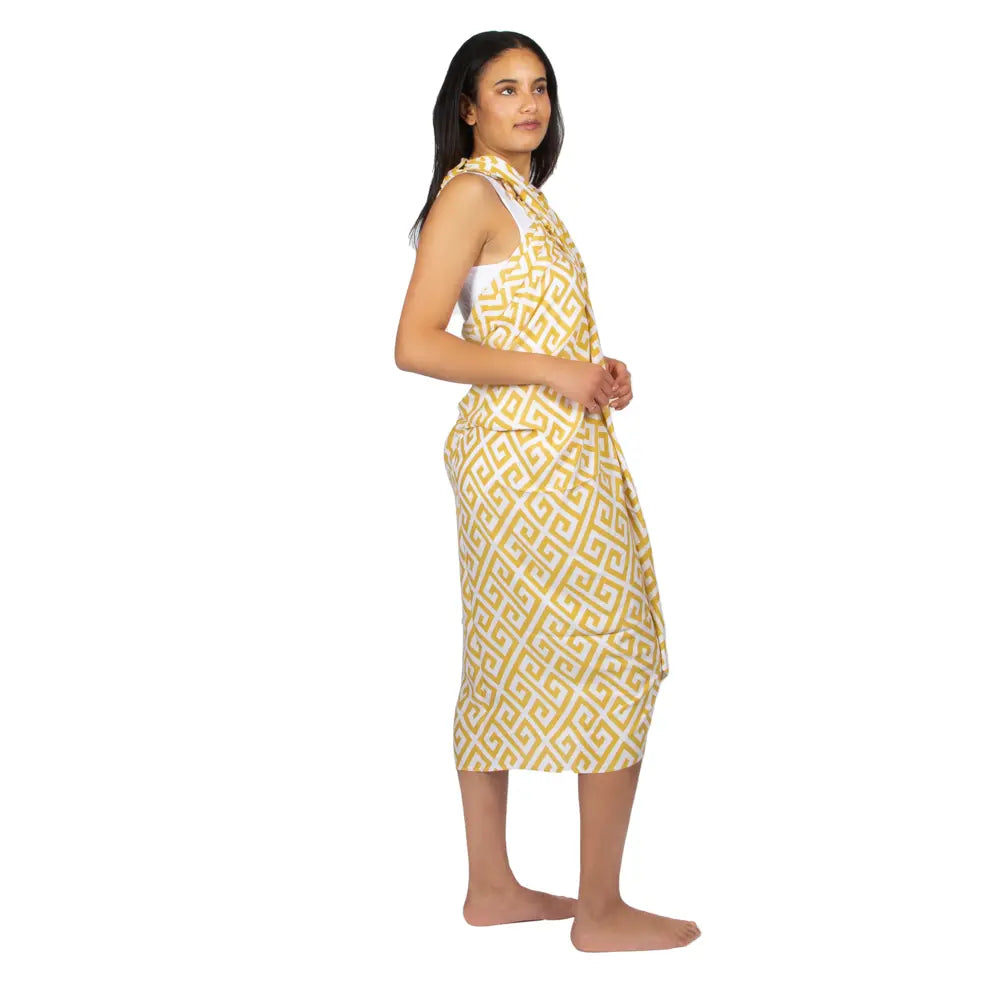Yellow sarong with geometric print from Suzie Blue Canada, perfect for trendy summer style and beachwear.