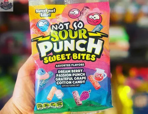 Colorful Sour Punch Sweet Bites candy in a clear bag from Snack Bar Co, showing bright, chewy candy pieces.