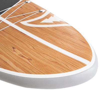 Taiga Board Nano ZIP AIR 9'8" inflatable SUP paddle board lying on water, compact design with a blue and white color scheme.