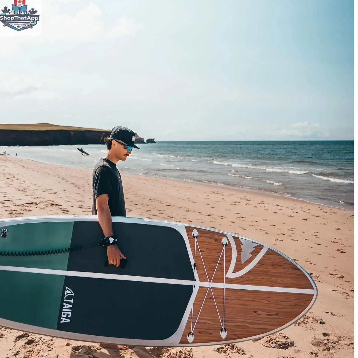 Taiga Board Nano ZIP Air 9'8" inflatable SUP paddle board on water, showcasing its compact design and durable construction.