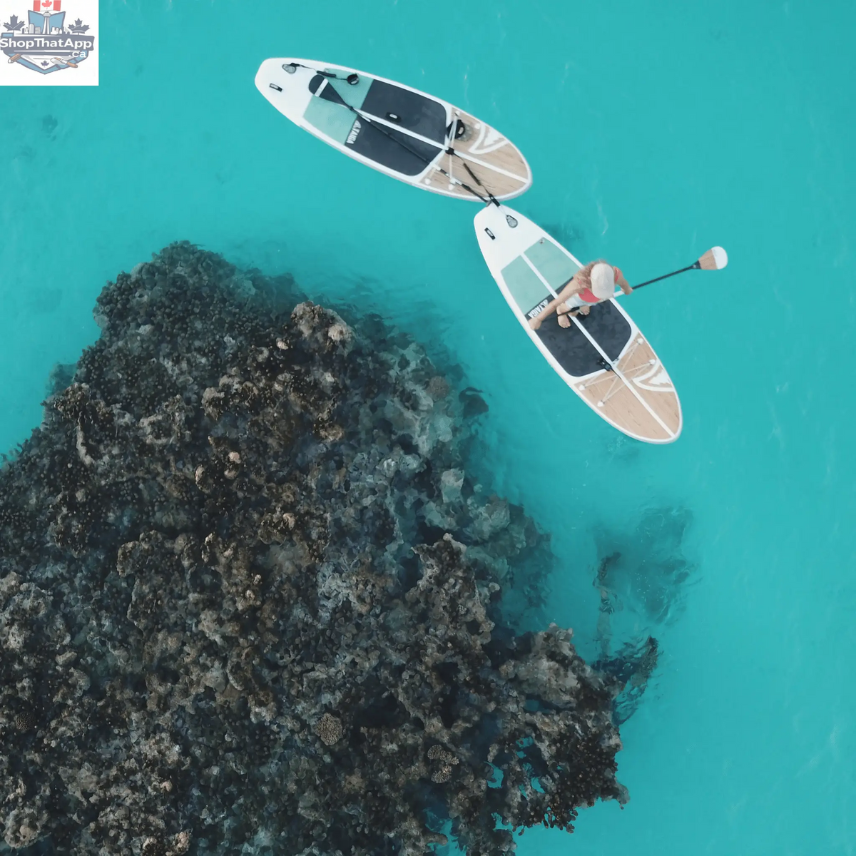 Taiga Board NANO ZIP AIR 9'8'' inflatable SUP paddle board on water, compact and lightweight for easy transport and paddling.