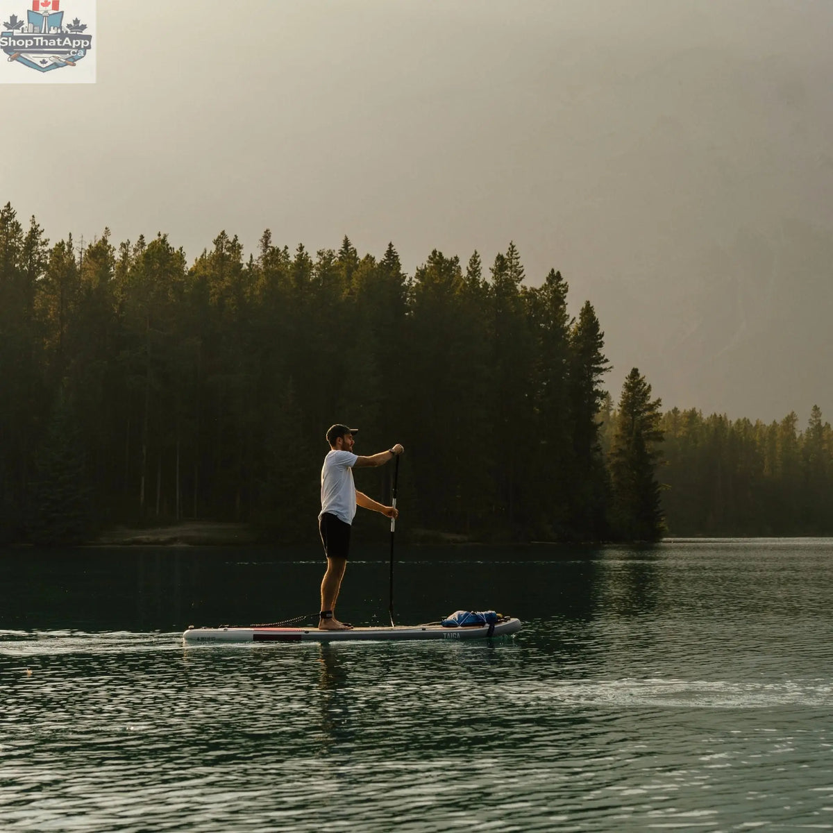 Inflatable 10-foot AWEN paddle board by Taiga Board, ideal for water adventures, shown inflated on water.