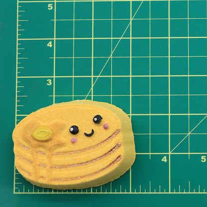 Mini pancake maker from The Bomb Bar Canada for effortless mini pancake cooking at home, shown in the image.