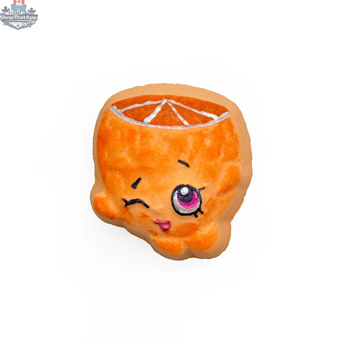 Orange with face bath and body product from The Bomb Bar Canada, featuring a realistic orange with facial features.