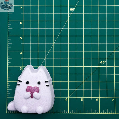 Pusheen Cat plush toy from The Bomb Bar Canada, soft and cuddly, perfect for cat lovers and plush toy enthusiasts.