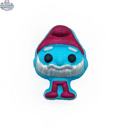 Blue Smurf-shaped bath bomb from The Bomb Bar Canada, resembling a cute Smuffin, perfect for bath and body relaxation.