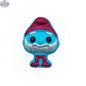 Blue Smurf-shaped bath bomb from The Bomb Bar Canada, resembling a cute Smuffin, perfect for bath and body relaxation.