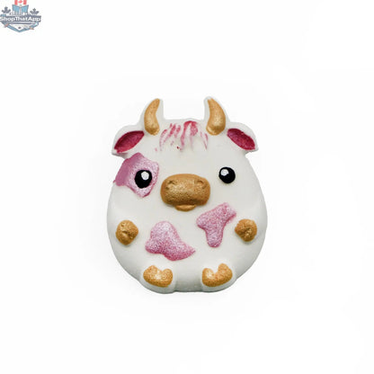 White plush cow toy from Strawberry Patch Cow collection by The Bomb Bar Canada, soft and adorable for kids' play and cuddling.