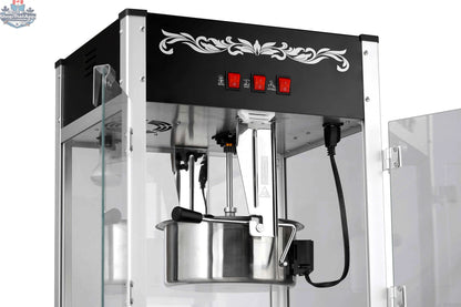 16oz black popcorn machine for commercial use by The Canada Popcorn Company, showing the machine with popcorn inside.
