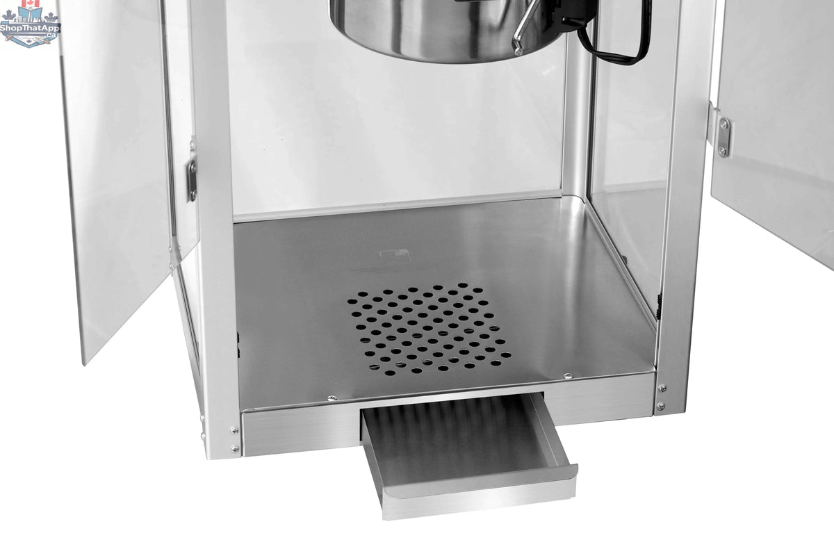 16oz black commercial popcorn machine from The Canada Popcorn Company with stainless steel kettle and clear glass lid.