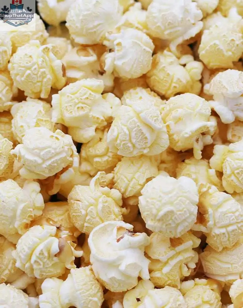 Bulk mushroom popcorn kernels from The Canada Popcorn Company, shown in a clear bag with assorted popcorn kernels.